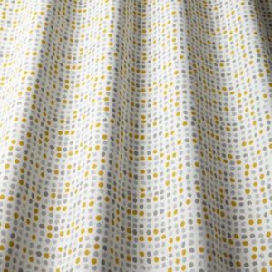 Dotted fabric in yellow and grey
